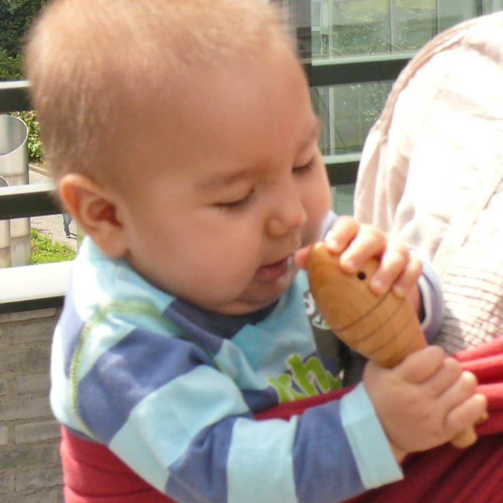 Wooden rattle, cherry wood Wooden rattle, cherry wood